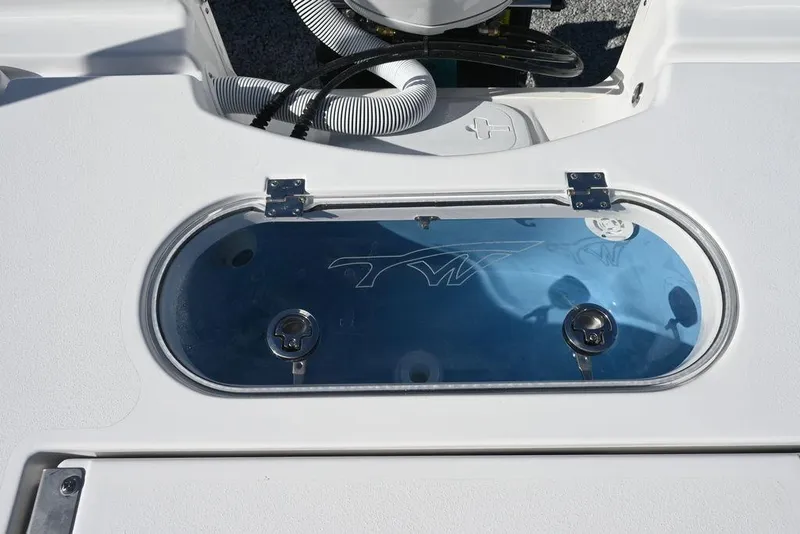 Slide: The Image of Livewell on 2026 Tidewater 2500 Carolina Bay boat, featuring sleek design and functionality. - 26
