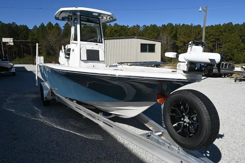 Slide: The Image of 2026 Tidewater 2500 Carolina Bay boat on trailer, parked outdoors. - 5