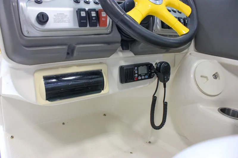 Slide: The Image of Interior of 2007 Azure AZ228 boat with steering wheel and control panel. - 19