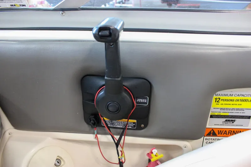 Slide: The Image of Control panel of 2007 Azure AZ228 boat with capacity warning label. - 21