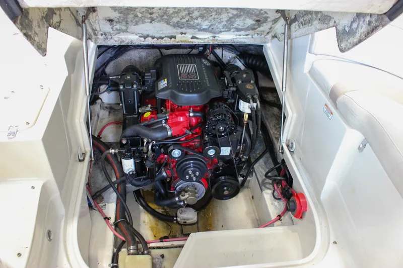 Slide: The Image of Engine compartment of a 2007 Azure AZ228 boat, showcasing detailed mechanical components. - 47