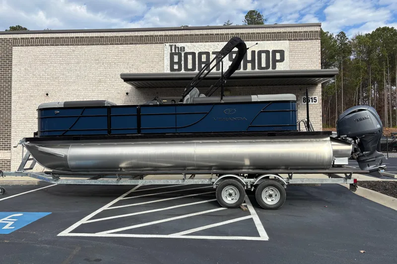 The Image of 2026 Veranda Relax VR22RC pontoon boat on trailer outside The Boat Shop. - 0