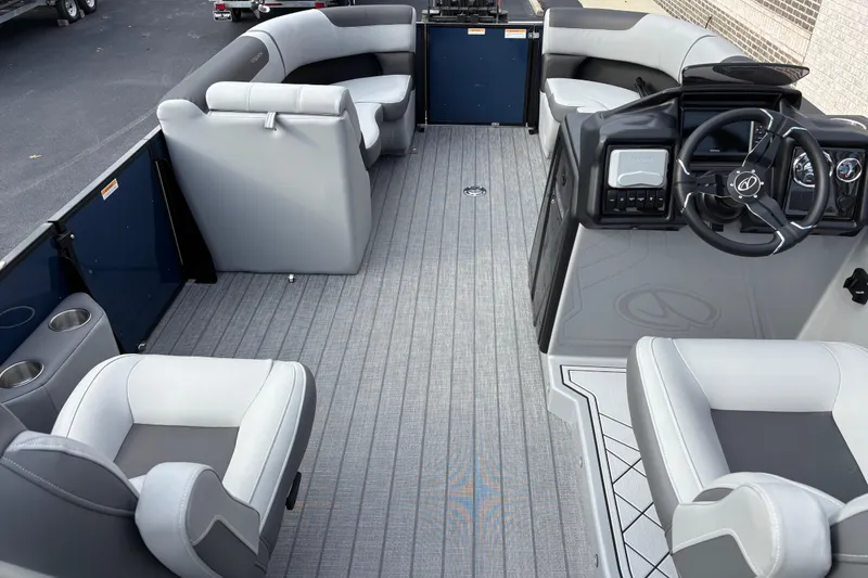 Slide: The Image of 2026 Veranda Relax VR22RC pontoon boat interior with modern seating and steering console. - 6