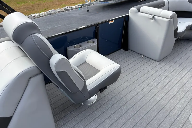 Slide: The Image of 2026 Veranda Relax VR22RC boat interior with gray seating and flooring. - 9