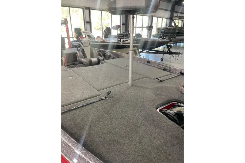 Slide: The Image of 2022 Skeeter FXR20 Apex boat interior with spacious deck and seating. - 12