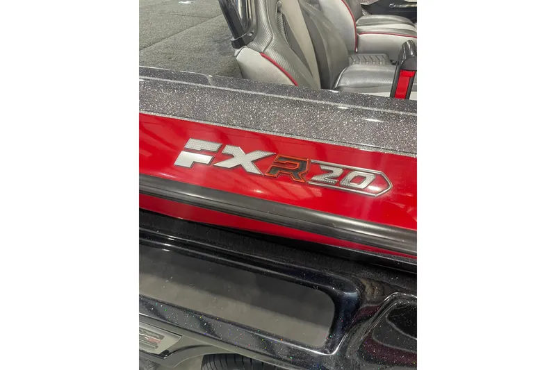 Slide: The Image of 2022 Skeeter FXR20 Apex boat, red and black detailing, interior view. - 14