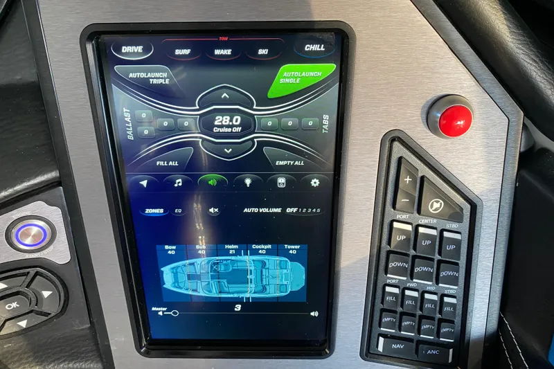 Slide: The Image of 2019 MasterCraft XStar control panel with touchscreen interface and navigation buttons. - 19