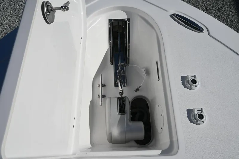 Slide: The Image of 2026 Tidewater 232 CC Adventure boat anchor compartment, featuring sleek design and modern fittings. - 22