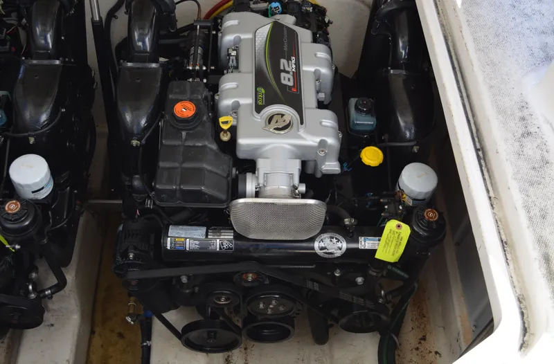 Slide: The Image of Engine compartment of a 2013 Monterey 340 Sport Yacht, featuring a powerful inboard engine. - 27