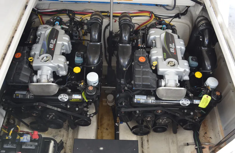 Slide: The Image of Twin engines in a 2013 Monterey 340 Sport Yacht engine compartment. - 29