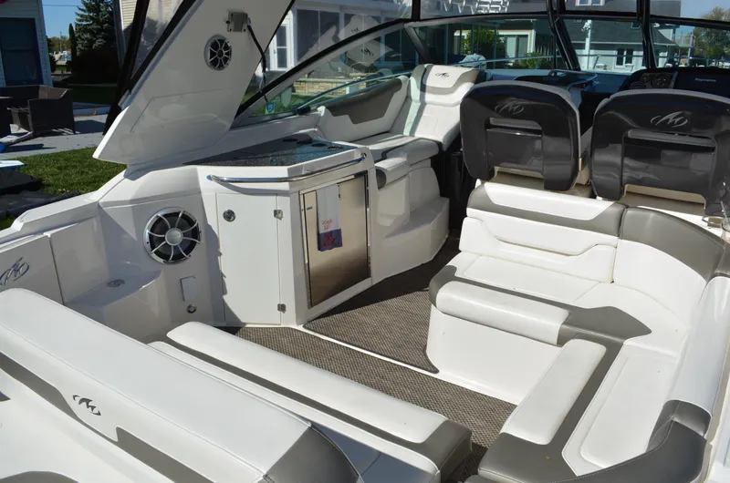 Slide: The Image of Luxurious interior of 2013 Monterey 340 Sport Yacht with plush seating and modern amenities. - 8