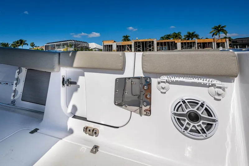 Slide: The Image of 2023 Sportsman Open 302 Center Console interior with speaker and seating detail. - 26