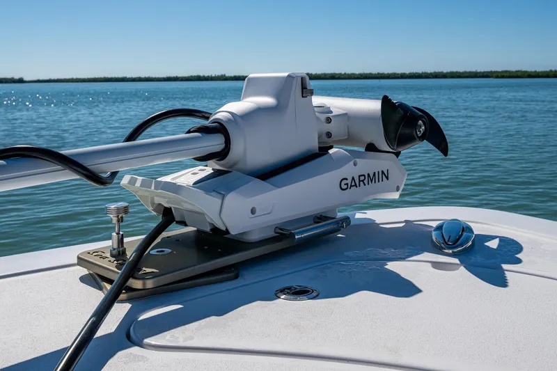 Slide: The Image of 2023 Sportsman Open 302 Center Console with Garmin equipment on deck, ocean view. - 45