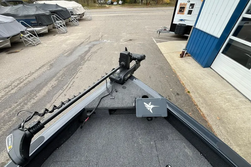 Slide: The Image of 2025 Crestliner 2050 Fish Hawk boat with trolling motor and navigation system. - 12