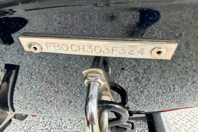 Slide: The Image of 2024 Falcon Boats F195 hull identification number plate on a boat's exterior. - 4