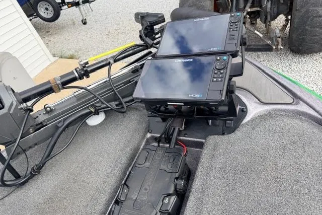 Slide: The Image of 2024 Falcon Boats F195 with dual Lowrance fish finders on deck. - 9