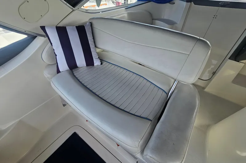 Slide: The Image of Interior seating of 2005 Bayliner 2855 Ciera with striped cushion. - 11