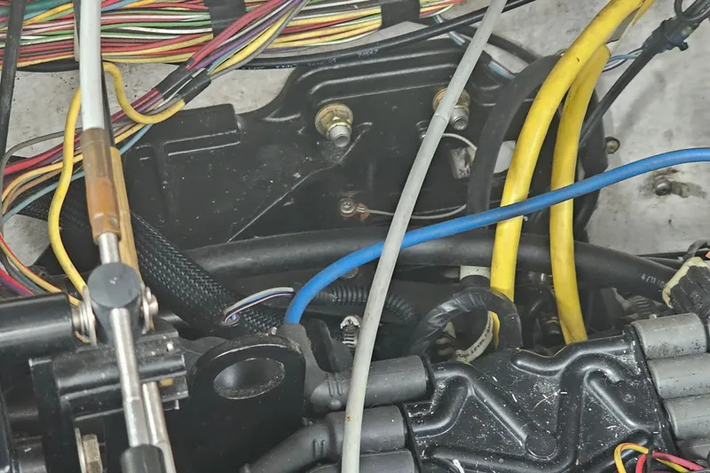 Slide: The Image of Engine wiring of a 2005 Bayliner 2855 Ciera boat, featuring colorful cables and components. - 35