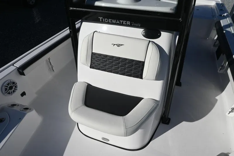 Slide: The Image of 2026 Tidewater 2300 Carolina Bay boat seat with black and white upholstery. - 11