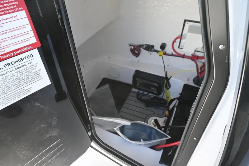 Slide: The Image of Interior view of 2026 Tidewater 2300 Carolina Bay boat's electrical compartment. - 20
