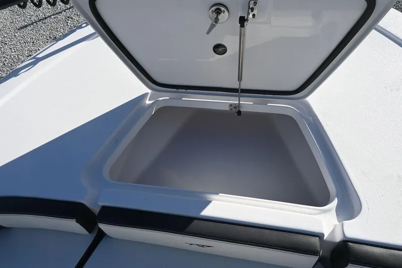 Slide: The Image of Open storage compartment on 2026 Tidewater 2300 Carolina Bay boat. - 21
