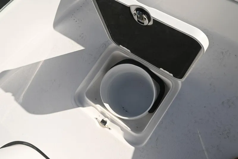 Slide: The Image of Open storage compartment on 2026 Tidewater 2300 Carolina Bay boat. - 24
