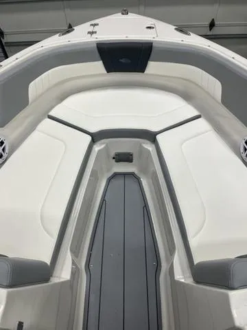 Slide: The Image of 2025 Chaparral 23 SSi boat interior, featuring sleek seating and modern design. - 9