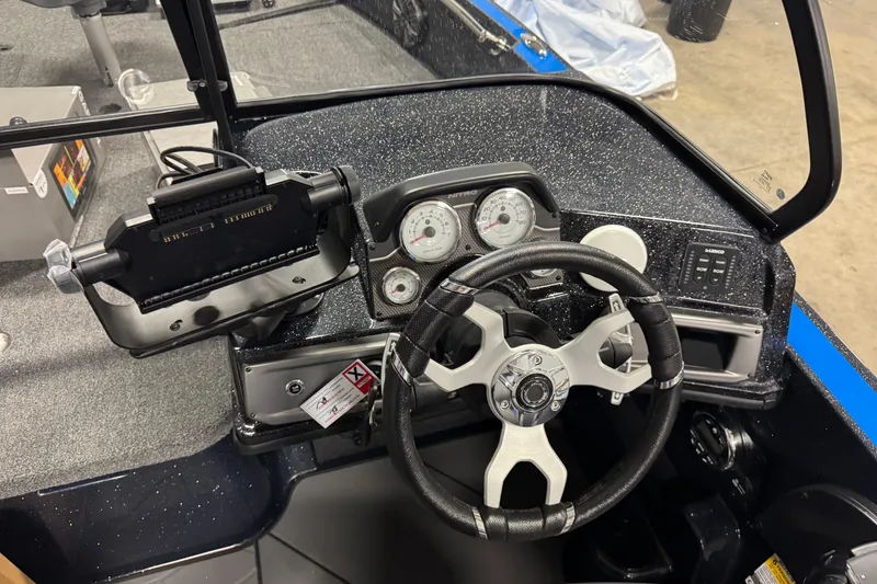 Slide: The Image of Dashboard of 2026 Nitro ZV20 Pro boat with steering wheel and gauges. - 10