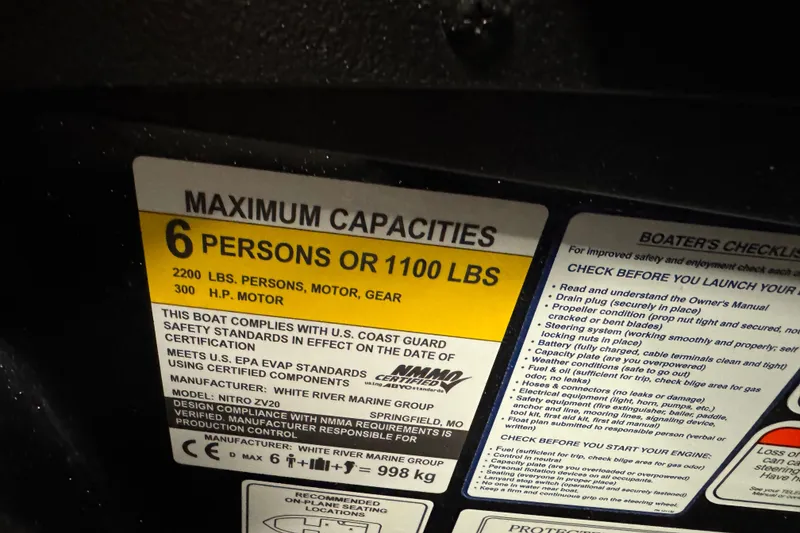 Slide: The Image of Maximum capacity label on Nitro ZV20 Pro boat, 2026 model, showing safety and compliance details. - 11