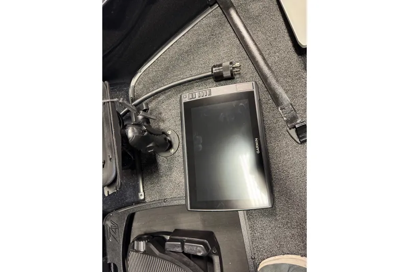 Slide: The Image of Garmin device on Nitro ZV20 Pro 2026 boat floor, with cables and mount. - 19