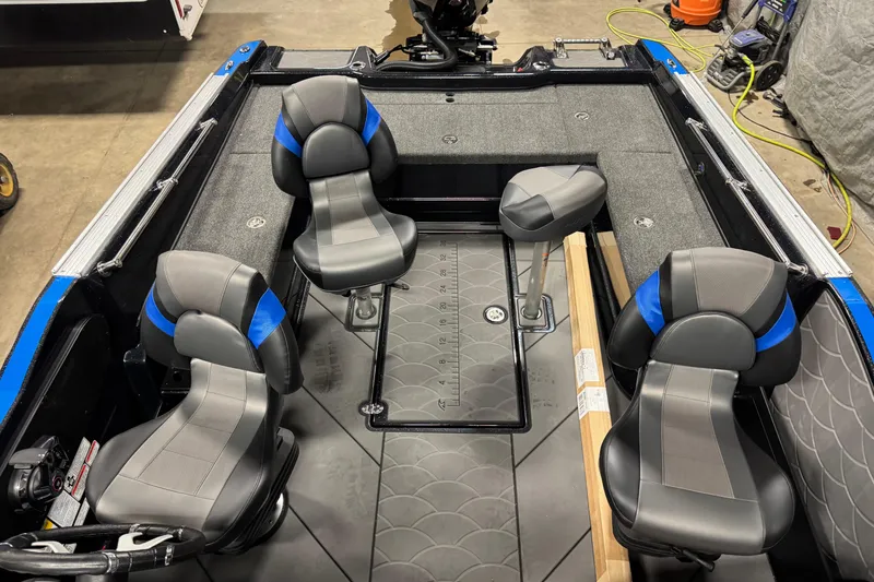 Slide: The Image of 2026 Nitro ZV20 Pro boat interior with four gray and blue seats, spacious layout. - 20