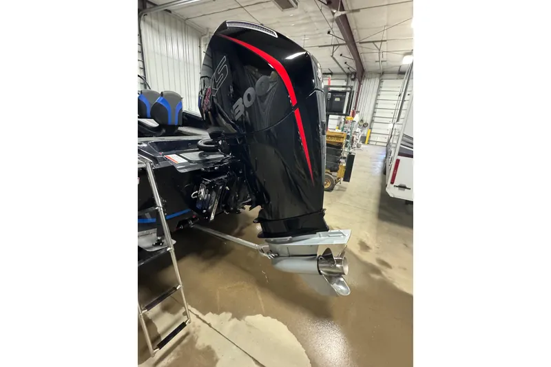 Slide: The Image of 2026 Nitro ZV20 Pro boat engine in a garage setting. - 6