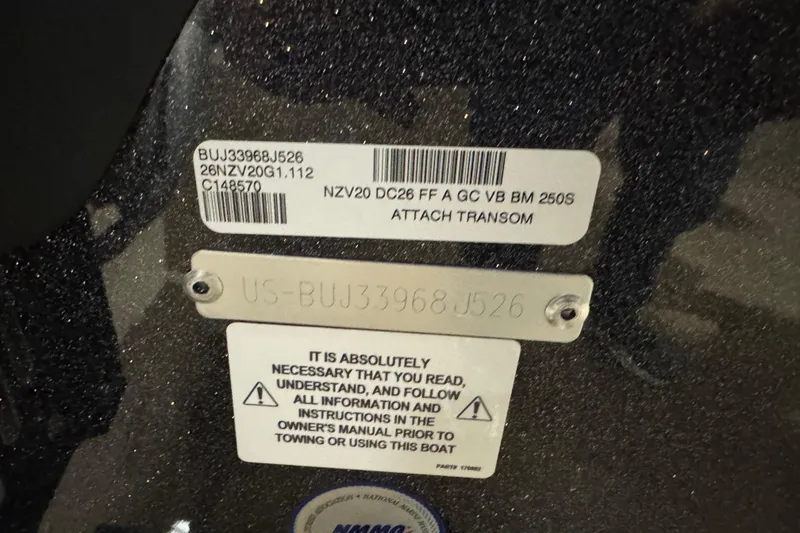 Slide: The Image of Close-up of Nitro ZV20 Pro 2026 boat identification and warning labels. - 7
