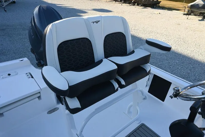 Slide: The Image of 2026 Tidewater 2110 Bay Max boat seats with black and white upholstery. - 11