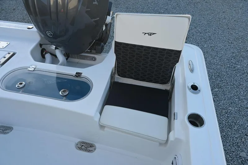 Slide: The Image of 2026 Tidewater 2110 Bay Max boat seat and motor detail, featuring sleek design and functionality. - 13