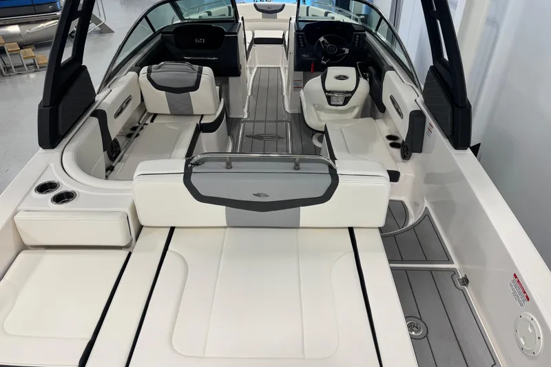 Slide: The Image of 2025 Chaparral 247 SSX boat interior with luxurious seating and modern design. - 5