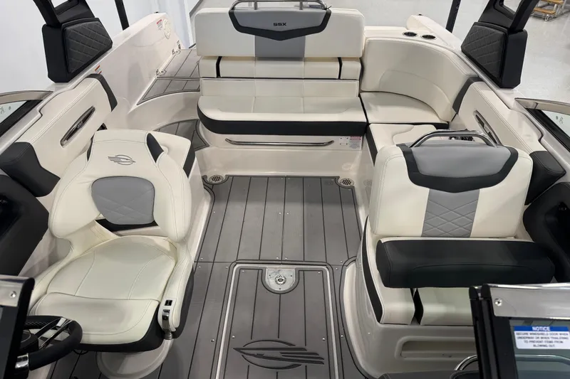 Slide: The Image of 2025 Chaparral 247 SSX boat interior with luxurious seating and modern design. - 6