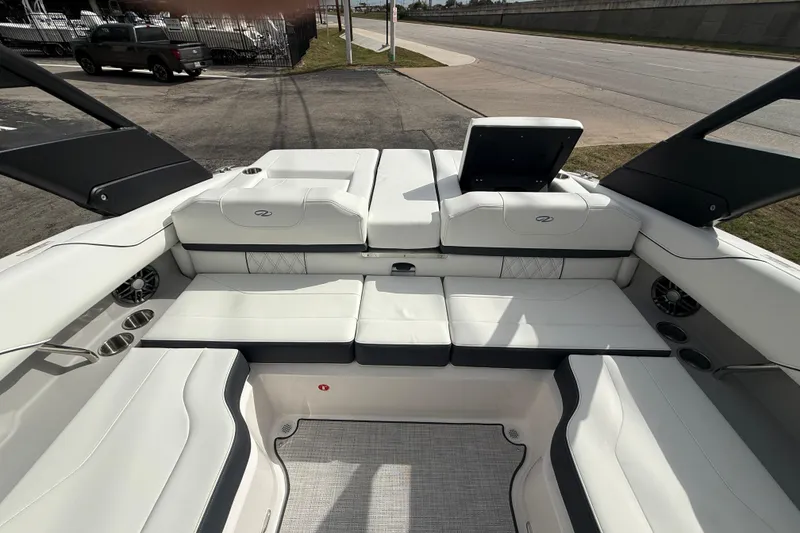 Slide: The Image of 2026 Regal LS2 boat interior with white seating and modern design. - 12