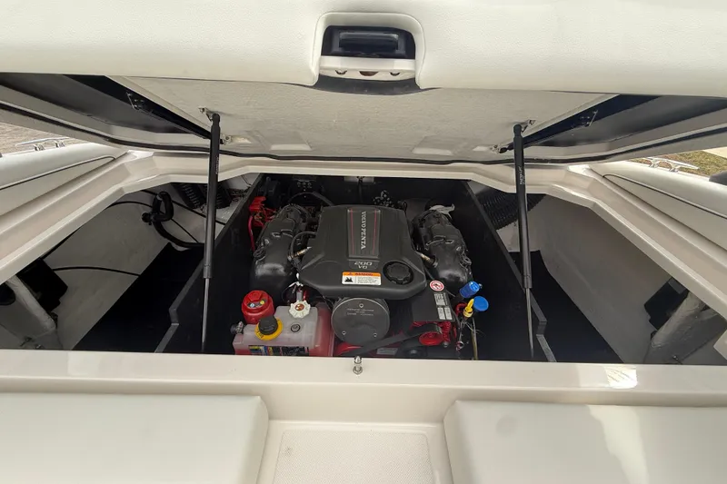 Slide: The Image of Engine compartment of 2026 Regal LS2 boat, showcasing modern design and components. - 14