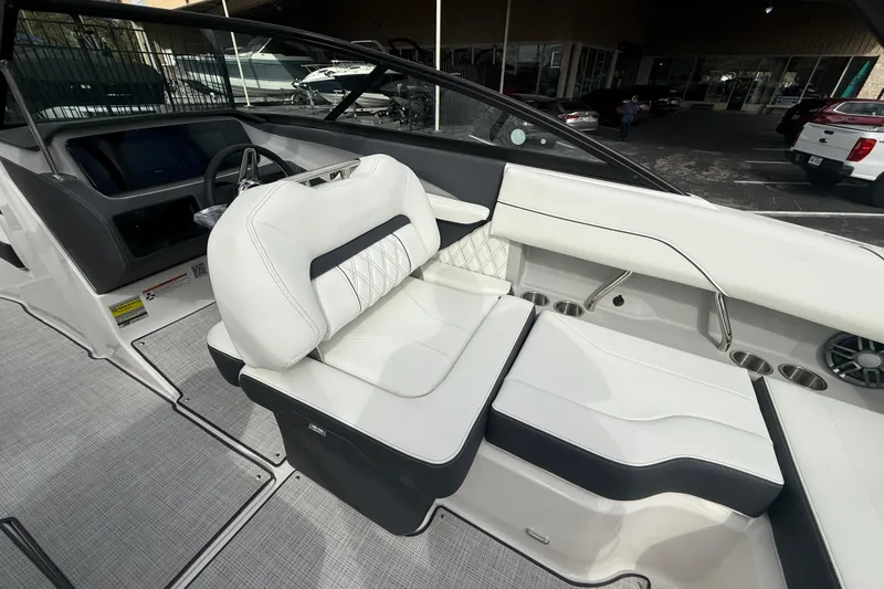 Slide: The Image of Luxurious interior of 2026 Regal LS2 boat with white leather seating and modern design. - 27