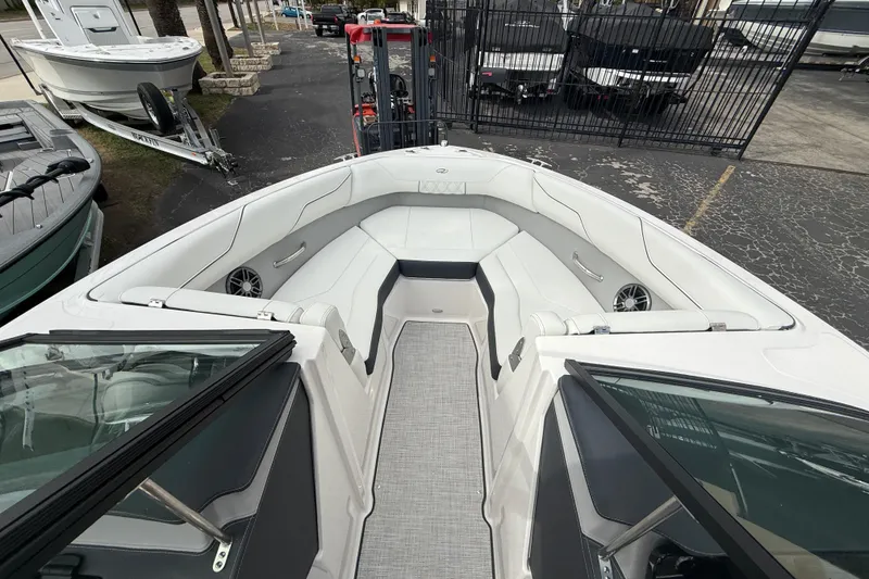 Slide: The Image of 2026 Regal LS2 boat interior with white seating and modern design. - 39