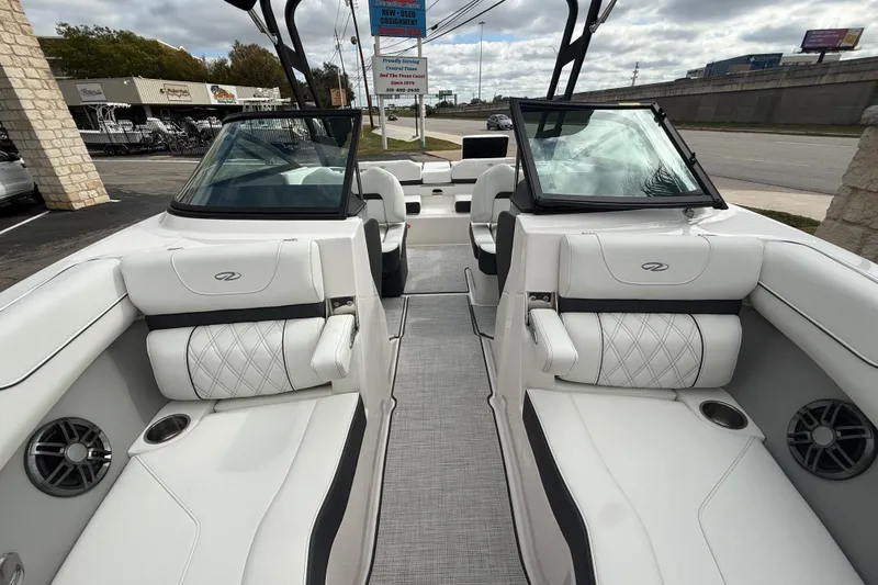 Slide: The Image of 2026 Regal LS2 boat interior with white seating and modern design. - 40