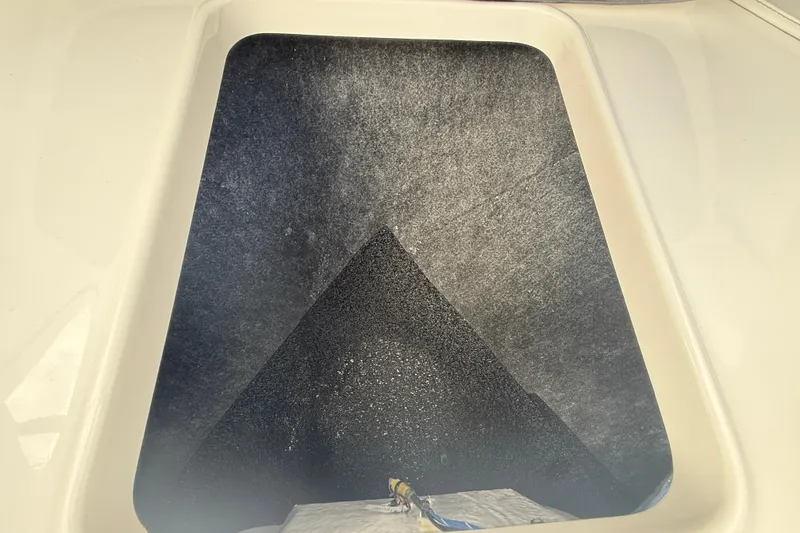 Slide: The Image of Interior view of 2026 Regal LS2 boat compartment with textured surface. - 48