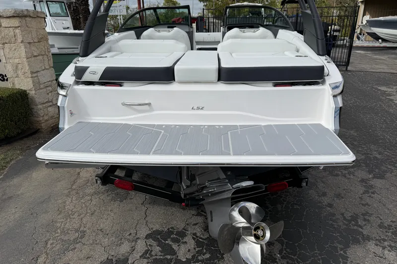 Slide: The Image of 2026 Regal LS2 boat with sleek design and modern features, rear view. - 8