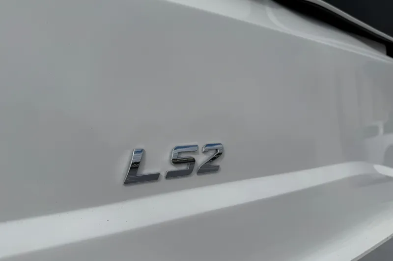 Slide: The Image of 2026 Regal LS2 emblem on sleek white surface. - 9