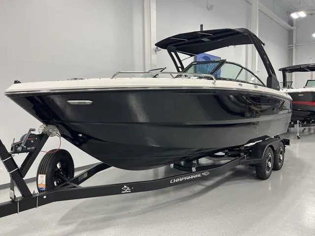 The Image of 2025 Chaparral 247 SSX boat on trailer in showroom. - 0