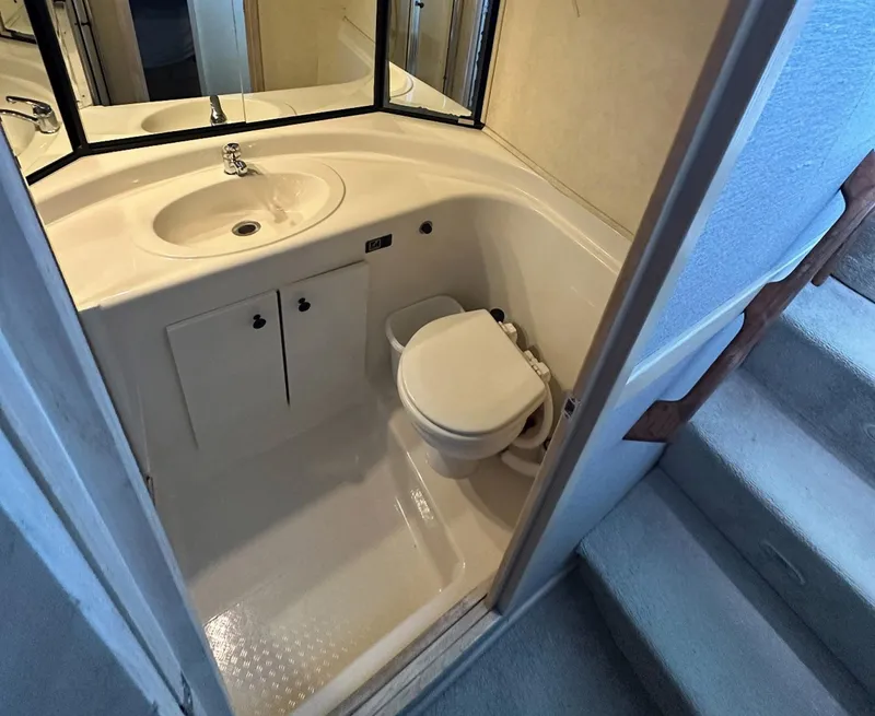 Slide: The Image of Bathroom interior of 1995 Bayliner 4788 Pilothouse Motoryacht with sink and toilet. - 16