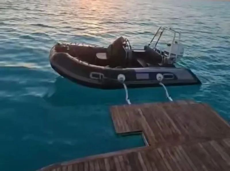 Slide: The Image of Inflatable boat docked on calm water near wooden pier at sunset. - 28