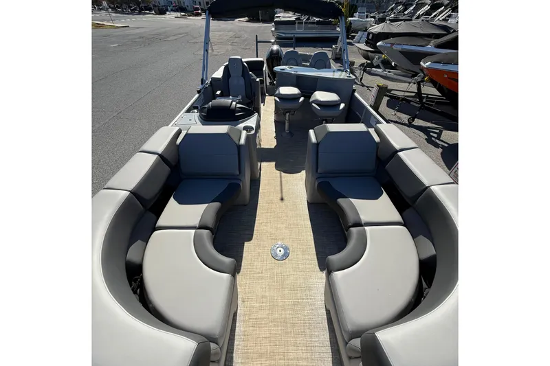 Slide: The Image of 2024 Berkshire 23E STS 3.0 pontoon boat with spacious seating and modern design. - 10