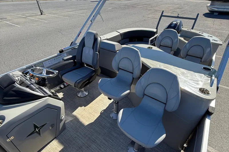 Slide: The Image of 2024 Berkshire 23E STS 3.0 pontoon boat interior with modern seating and helm. - 11